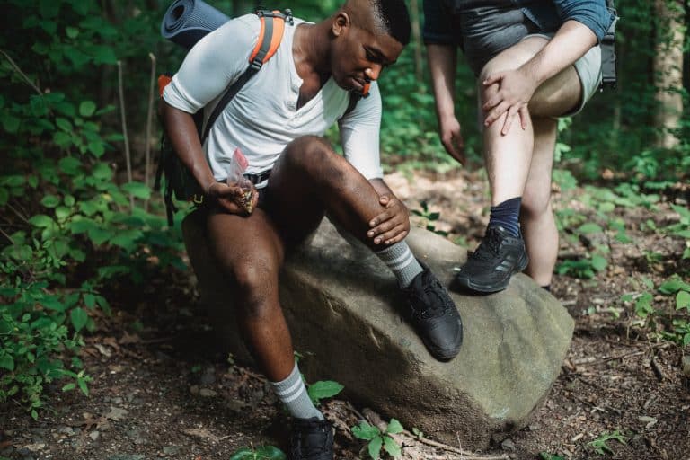 Hikers checking themselves for ticks.
