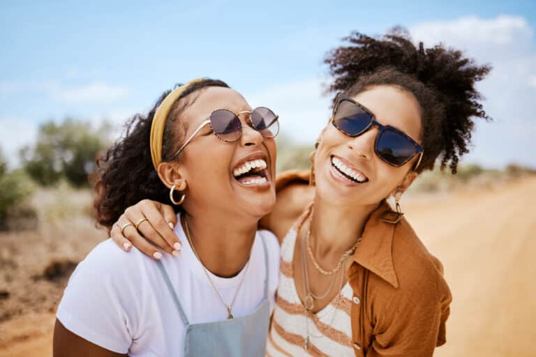 Two friends laughing together