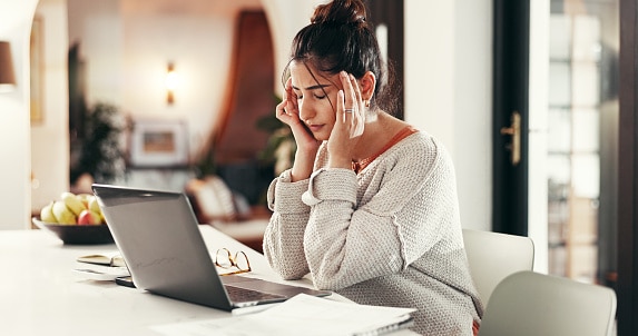 Young woman with tinnitus dealing with the frustrating ringing and brain fog. Young woman with tinnitus dealing with the frustrating ringing and brain fog.